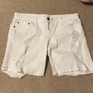 Ripped white jean shorts